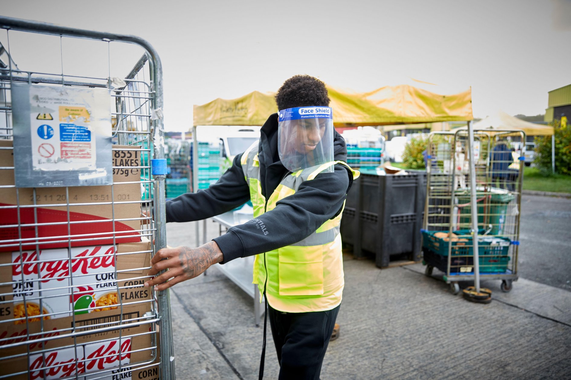 inspirations equality and diversity Marcus Rashford MBE English professional footballer visiting FareShare Greater Manchester at New Smithfield Market.